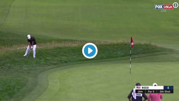 Patrick Reed snaps his wedge in frustration